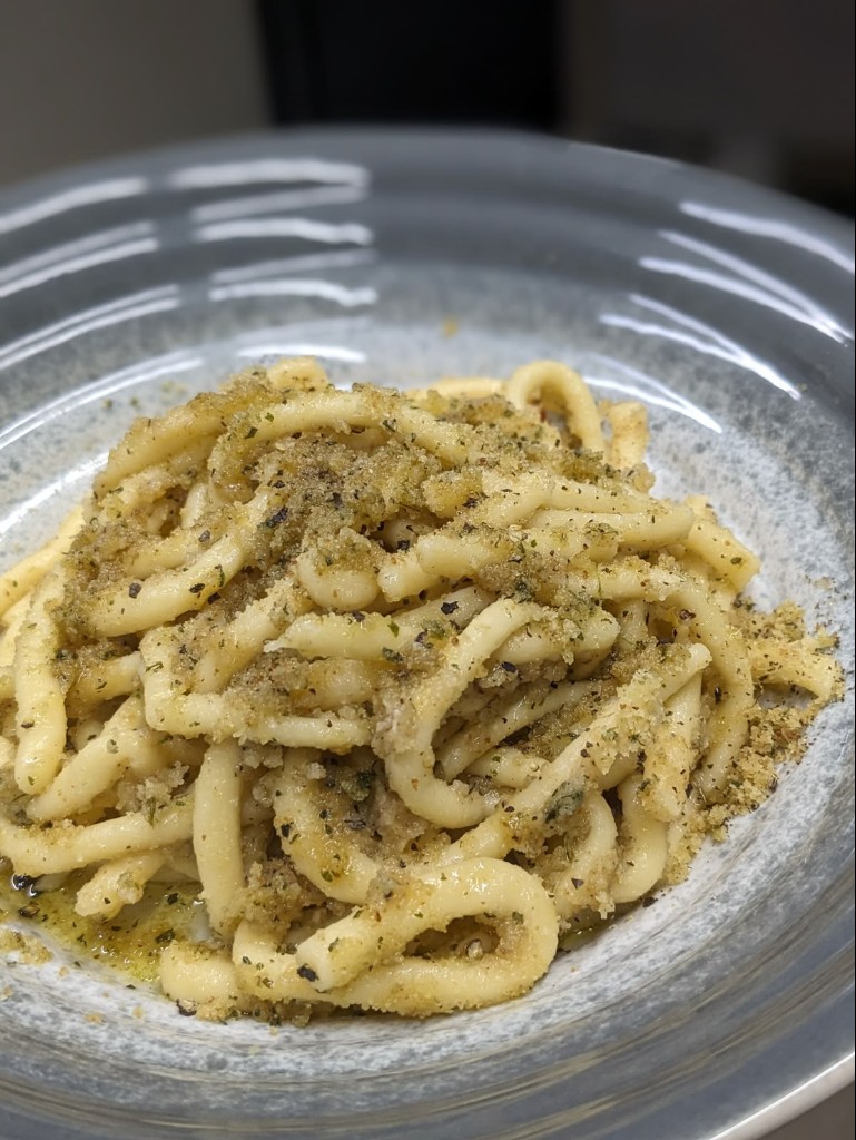 Handmade pici pasta served in Tuscany.