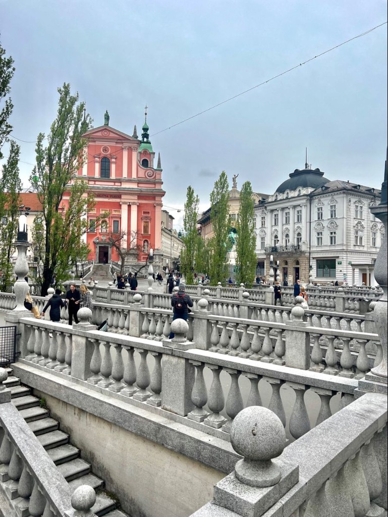 Ljubljana’s Triple Bridge over the Ljubljanica River with the Franciscan Church behind it.